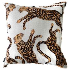 an animal print pillow with leopards on it