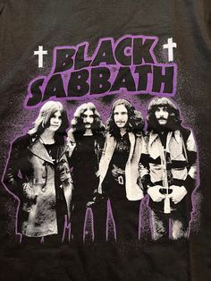 the black sabrath band t - shirt is shown in purple and black with an image of them on it