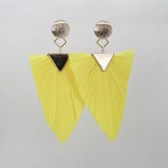 Introducing our stunning summer style LaLa statement earrings, handcrafted from high-quality natural dried palm leafs and featuring an array of bright and vibrant colors that perfectly capture the essence of the season. These earrings are the perfect accessory for any warm weather occasion, from beach parties to outdoor festivals and everything in between. Measuring at a comfortable and lightweight size, these earrings are designed to make a bold statement and add a pop of color to any outfit. T Spring Beach Tassel Earrings, Spring Beach Tassel Drop Earrings, Trendy Summer Tassel Dangle Earrings, Trendy Dangle Tassel Earrings For Summer, Vibrant Green Earrings For Beach, Spring Beach Dangle Earrings, Multicolor Summer Earrings, Green Tassel Earrings For Beach, Bohemian Yellow Earrings For Beach