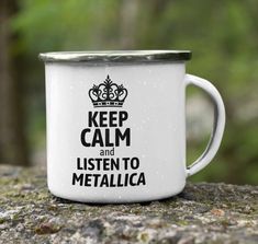 a white coffee mug with the words keep calm and listen to metallicica on it