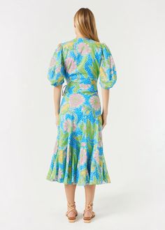 Floral Print Fiona Dress | Blue Psychedelic Flower Grande Garden Party V-neck Midi Dress With Gathered Sleeves, Spring Ruched Midi Wrap Dress, Spring Blue Wrap Dress With Surplice Neckline, Spring Ruched Wrap Dress Midi Length, Spring Wrap Dress With Ruched Detail, Midi Length, Spring Dress With Gathered Sleeves And Surplice Neckline, Fitted Midi Dress With Ruffle Hem And Surplice Neckline, Fitted Wrap Dress With Tie Waist For Garden Party, Spring Ruched Wrap Dress