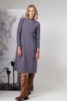 - Midi length dress. - Reverse side out. - Stand-up collar. - Long set-in sleeves. - Clean edge. - Normal fit. Garment is knitted from 100% pure new wool on manual knitting machine. Seams are sewn with sewing machine and hand crafted to give the best quality. Garment is washed and ironed - ready to wear. About wool -  SUPERSOFT (100% pure new wool) is mulesing free lambs wool that is our main yarn. We've been using it from the day 'pappus' was born. It's versatile, easy to work with. It allows almost every idea to come true. Supersoft is perfect for everyday wearing. Garments are light-weight, durable, easy to take care. We use Supersoft 2ply yarn. 2ply mean that two threads are twisted together, to make yarn more durable and thicker. Model is 180 cm/5'9 tall and wears size M. Ready garmen Gray A-line Winter Dresses, Gray Knit Dress For Fall, Gray Midi-length Sweater Dress For Fall, Winter High Neck Stretch Long Sleeve Dress, Gray Knee-length Winter Dress, Winter Workwear Long Sleeve Stretch Dress, Long Sleeve Wool Sweater Dress For Work, Casual Long Sleeve Wool Sweater Dress, Fitted Sweater For Daywear In Winter