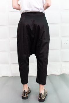 "Black Harem Pants, Cyberpunk Clothing, Drop Crotch Pants These comfortable baggy pants have a drop crotch design an are with an ankle length so these relaxed black cotton pants will make your style trendy and unique and keep you comfortable in your daily activities. ------------------------------------------------ FEATURES: 🌟 Made of cotton fabric 🌟 Two pockets on each side 🌟 Sizes from XS to 5XL - plus sizes available, please write us /the model is wearing size S/ 🌟 Available in black, whi Loose Pants Plus Size, Black Pants Baggy, Baggy Pants Women, Cyberpunk Clothing, Black Harem Pants, Cyberpunk Clothes, Drop Crotch Pants, Pants Baggy, Pants Plus Size