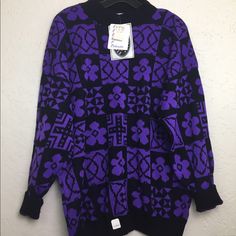 Nwt 90s Vintage Black And Purple Floral Pattern Pull Over Sweater By Classic Essentials, 80s Nwt Bright Color Grandma Sweater Condition New With Tags. Has Never Been Worn Or Washed. No Issues. Tag Size: 22w Or 3x Purple & Black Measurements Neck: 9” Shoulders: 26” Arm: 9”W X 17”L Chest: 24” Length: 27” Follow Us On Fb & Ig @Vintagepopandvice Vintagepopandvice.Com 90s Style Purple Sweater For Fall, 90s Style Purple Fall Sweater, Purple 90s Style Tops For Fall, Purple 90s Style Top For Fall, 90s Purple Winter Sweater, Retro Purple Long Sleeve Sweater, Retro Purple Winter Tops, Vintage Purple Winter Tops, Light Brown Jeans