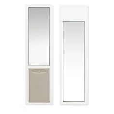 a white door with a mirror above it and a light on the wall next to it