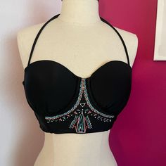 Never Worn!! Black With Teal, Pink, White. Halter Straps (Removable) And Back Crisscross Design. Underwire & Padding. Strapless Black Halter Top For Vacation, Black Bandeau Halter Top With Built-in Bra, Black Tankini With Removable Bra Pads For Beach, Black Tankini With Padded Cups, Black Halter Neck Tankini, Bra Friendly, Bra Friendly Black Halter Neck Tankini, Black Halter Neck Tankini, Bra-friendly, Black Halter Neck Bra-friendly Tankini, Black Halter Top With Removable Bra Pads For Summer