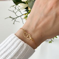 Celebrate the beautiful, unbreakable bond between a mother and her daughter with our Double Heart Bracelet, featuring elegantly interlocking hearts. This symbolic piece represents the deep connection and love shared, making it a perfect gift for both moms and daughters. Comes with a Mother & Daughter card - if you would like to remove it or change it - please let us know.  Create a wonderful set and purchase two bracelets - one for Mum, one for daughter.  ITEM DETAILS: ∙ Available in premium 925 Name Bracelet With Heart Charm For Gift, Valentine's Day Bracelet Jewelry Gift For Mom, Valentine's Day Jewelry Bracelet Gift For Mom, Valentine's Day Gift Bracelet For Mom, Double Heart Charm Bracelet As Gift, Heart Charm Bracelet For Gifts, Double Heart Shape, Double Heart Charm Bracelets For Gifts, Dainty Double Heart Charm Bracelet Gift, Elegant Heart-shaped Bracelet For Mom