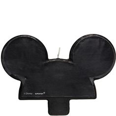 a mickey mouse head shaped object on a white background