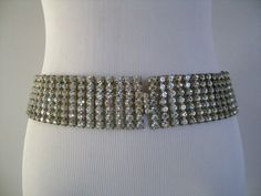 "This is a Stunning Vintage Blinding Sparkling Round Cut Chaton Diamante Rhinestones Fancy Bridal Wedding Belt Sash or Necklace Silver Tone Metal Fabulous Well Made a Great Quality Vintage Piece! The belt measures from end to end is 29-1/4\" long by 1-7/8\" wide,The belt is in very good vintage condition with little/minor signs of wear due to its age, the silver tone finish at the back of the belt little bit discoloration. NO missing rhinestone, all rhinestones are sparkle beautiful very clean a Silver Fitted Sash For Party, Fitted Rhinestone Sashes For Party, Fitted Silver Sash For Party, Party Fitted Sashes With Rhinestones, Glamorous Bridal Belt With Rhinestones For Party, Crystal Bridal Belt For Party, Glamorous Party Bridal Belt With Rhinestones, Silver Rhinestone Sashes For Formal Occasions, Silver Rhinestone Sashes For Party