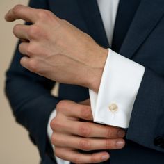 These 14k gold cufflinks are perfect for everyday wear or for special occasions. 14k yellow gold or white gold Each Cufflink weighs 18 grams, totaling 36 grams for the pair Diameter is 0.5 inches 1.5mm thickness Sold as a pair Includes your choice of either a laser or hand engraved monogram in all caps in a serif font - up to 3 characters only Read more about the classic cufflinks design here Please allow 6-8 weeks for production as this piece is made to order just for you Classic Cufflinks, Monogrammed Cufflinks, 3 Characters, Everyday Luxury, Gold Cufflinks, Cufflinks Men, Gold Hands, Everyday Luxuries, Classic Gold