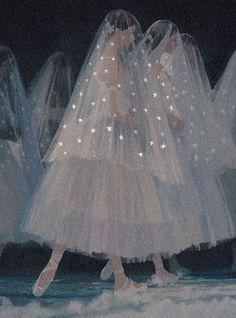 a group of women in white dresses and veils walking on snow covered ground with stars