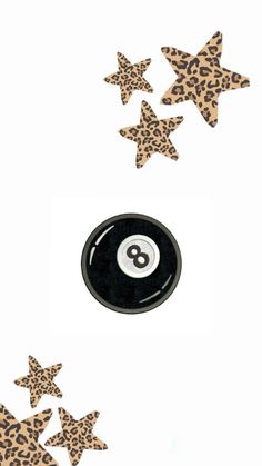 a pool ball and five stars on a white background with the number eight in leopard print