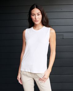 Our soft and stretchy modal cotton blend is wrinkle resistant with a flattering, smooth finish. So, perfect for an easygoing everyday tee.  | Quince | Women's Cotton Modal Muscle Tank Top in White, Size XS, Cotton/Modal Quince Tops, Silk Tee, Boyfriend Cardigan, Muscle Tank Top, Linen Tank, Muscle Tank Tops, Scoop Neck Tee, White Sleeveless, Muscle Tank