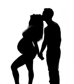 a man and woman kissing in silhouette against a white background with their hands on each other's butts