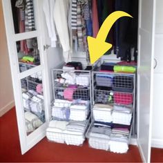 the closet is full of clothes and other items in it, with an arrow pointing to the