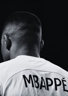 a black and white photo of a man in a baseball uniform with the words mabape on it