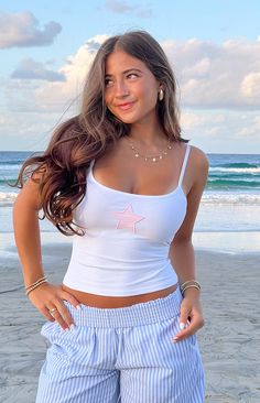 Scottie White Star Singlet Teen Makeup Ideas, Linen Pants Outfits, White Tank Top Outfit, Hard Fits, Clothes Wishlist, Striped Tube Top, Star Graphic, Prom Midi Dress, Teen Clothes