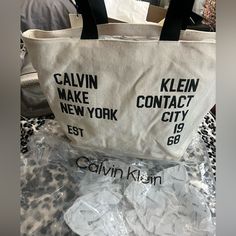 Calvin Klein Tote Bag. Cream/Black. Nwt. Bundle And $Ave Calvin Klein Tote Bag, White Calvin Klein, Calvin Klein Handbags, Calvin Klein Bags, Studded Purse, Calvin Klein Bag, White Tote Bag, Fabric Tote Bags, Large Leather Tote