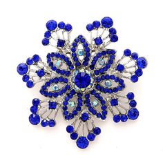 Rhinestone royal blue brooch jewelry embellishment, which can be used for your DIY project - Sapphire blue wedding, bridal jewelry, brooch bouquet charm handle, cake and frame decoration, corsage, event decor, crafts, scrap booking and much more. Size: 2 1/4 inch high 2 1/4 inches wide Stones color: Royal blue and iridescent Metal: Silver plated This crystal blue broach can be ordered with pin in the back to wire into brooch bouquet, add to wedding gown or dress sash, or any number of other craf Sapphire Blue Wedding, Sapphire Blue Weddings, Blue Brooch, Something Blue Wedding, Jewelry Brooch, Bridal Bridesmaid Dresses, Dress Sash, Brooch Bouquet, Wedding Brooch