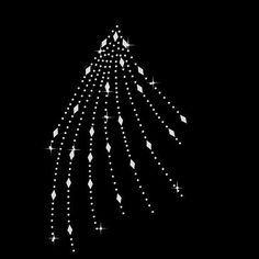 a christmas tree made up of diamonds on a black background