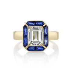 an emerald and blue sapphire ring, by van cleef in yellow gold with diamonds