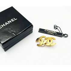 This is part of Chairish’s Costume Jewelry assortment.  Chanel Gold Plated Gold Matte Texture Clip on Earrings  *Marked 29 & 2914 *Comes with the original box and tag  -Approximately 1" x 0.75" -This is one of the most coveted and best selling classic Chanel earrings. -Very shiny and clean -In an excellent vintage condition Designer Formal Brooch Jewelry, Gold Jewelry For Anniversary In Original Box, Gold Jewelry For Anniversary With Original Box, Designer Yellow Gold Brooches For Gift, Gold Jewelry As A Gift In Original Box, Designer Yellow Gold Brooches As Gift, Elegant Formal Jewelry With Original Box, Classic Chanel, Matte Texture