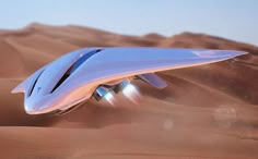 a futuristic flying vehicle in the desert