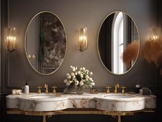 a bathroom with two sinks and three mirrors on the wall, one has a bouquet of flowers in front of it