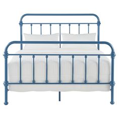 a blue metal bed frame with white pillows