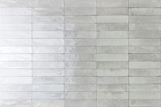 City Distressed Subway Tile Light Grey Glossy 2x10 installed on a wall Distressed Subway Tile, Light Grey Backsplash, Porcelain Subway Tile, Brick Effect Tiles, Grey Subway Tiles, Subway Tiles Bathroom, Grey Backsplash, Polished Porcelain Tiles, Grey Brick