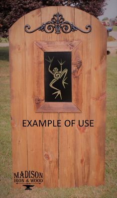 a wooden sign with an image of a frog on it's face and the words example of use