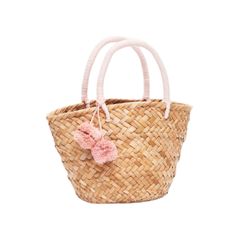 a straw bag with pink handles and a bow on the handle, against a white background