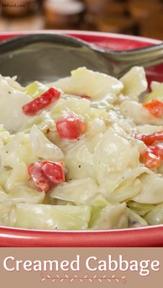 a close up of a bowl of food with a spoon in it and the words creamed cabbage