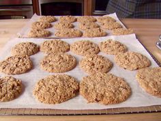 cookies are cooling on a cookie sheet ready to go into the oven in the oven