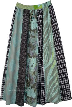 This is a vertical patchwork skirt in accordion pleats that start out smaller at the waist and get larger towards the hem - a design that is known to make you look taller.  It has an elastic waist with a drawstring to allow for flexibility and a comfortable fit. #tlb #Patchwork #MaxiSkirt #bohemianfashion #Doripatchworkskirt #HippiePatchworkSkirt #RecycledPatchworkSkirt Black Patchwork Tiered Skirt, Black Tiered Patchwork Skirt, Green Flowy Patchwork Maxi Skirt, Green Flowy Maxi Skirt With Patchwork, Spring Green Patchwork Maxi Skirt, Flowy Tiered Patchwork Skirt, Flowy Midi Skirt With Patchwork, Green Long Patchwork Skirt, Green Long Skirt With Patchwork