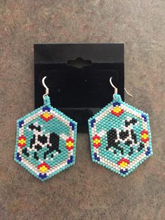 1 3/4inch L by 1 1/4 inch width. Made with size 11 delica beads $3 shipping. Turquoise Earrings With Large Beads For Gifts, Southwestern Style Large Beads Earrings For Gift, Handmade Southwestern Rectangular Jewelry, Southwestern Handmade Rectangular Jewelry, Beaded Rectangular Jewelry Gift, Beaded Rectangular Jewelry For Gifts, Southwestern Style Beaded Earrings With Ear Wire As Gift, Handmade Southwestern Beaded Earrings For Gifts, Rectangular Colorful Beaded Earrings As Gift