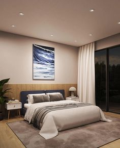 a bedroom with a large bed sitting under a painting on the wall next to a sliding glass door