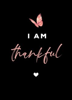 the words i am grateful with a pink butterfly