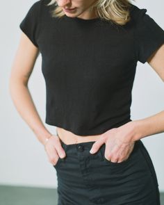 The Lou is our version of the classic boy tee, with a narrow fit in the shoulders and a slight crop (the perfect counterpart for high-waisted denim). Made from 100% silk noil, it’s the perfect-fitting, super-soft staple you always reach for; designed to get better with age and distinguished by the specific, perfectly imperfect nubby texture of raw silk. Soft-washed Black Crew Top, Black Relaxed Fit Ribbed T-shirt, Black Moisture-wicking Muscle Tee, Sporty Relaxed Fit Washed Black T-shirt, Black Soft-washed Relaxed Fit T-shirt, The Undone, Silk Noil, Boy Tees, Perfectly Imperfect