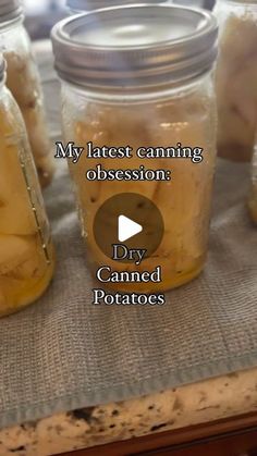 jars filled with food sitting on top of a table