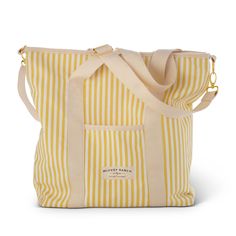 This bright and sunny cooler bag is the ideal picnic companion. Whether you’re carrying the ingredients for your favorite charcuterie board, or a bottle of wine, keep it all at the perfect temperature in this beautiful insulated tote bag. Shop our Mama-To-Be Gift Set featuring this adorable insulated bag. Yellow Rectangular Travel Lunch Bag, Troop Beverly Hills, Insulated Tote Bag, Picnic Cooler Bag, Cooler Bags, Picnic Cooler, Eco Lifestyle, A Bottle Of Wine, Cooler Tote