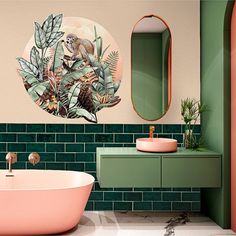 a bathroom with a tub, sink and mirror in the corner next to a green tiled wall