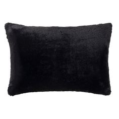 a black pillow on a white background