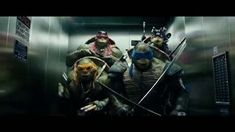 the teenage mutant ninjas are walking through an elevator with swords in their hands and helmets on