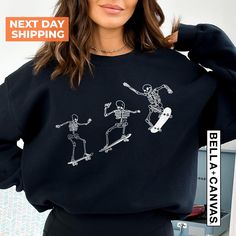 Skateboarding Skeletons Crewneck Sweatshirt, Halloween Skeleton Sweatshirt, Skeleton Trendy, Halloween Sweatshirt, Vintage Skeletons Shirt BLACK TEXT is used by for Yellow, Heather Peach, White, Light Gray Heather Shirts. WHITE TEXT is used by Other Colored Shirts. Welcome to our shop, RoseTeesDesign. We hope you enjoy shopping and browsing through our fun selection of t-shirts. We try out best to provide the best quality for our customers and value your satisfaction before anything else. We hope to make you happy and bring more joy to Esty, while keeping our values high as a small business. 😊 We all hope you have a nice day. Thank you for visiting our website and choosing and trusting us. We love and accept all customers.  HOW TO ORDER SHIRT 1-) Please, Check and Review all Photos. 2-) S Casual Fall Skateboarding Sweatshirt, Casual Fall Sweatshirt For Skateboarding, Casual Long Sleeve Tops For Skateboarding, Grunge Crew Neck Top For Skateboarding, Black Crew Neck Top For Skateboarding, Black Long Sleeve Sweatshirt For Skateboarding, Casual Crew Neck Sweatshirt For Skateboarding, Relaxed Fit Crew Neck Tops For Skateboarding, Skeleton Sweatshirt