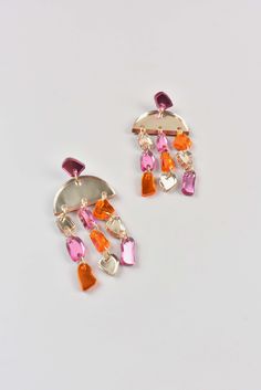 One of a kind statement earrings with a pink metallic stud with shades of pink and amber dangles. 2.5" drop Laser cut acrylic Surgical stainless steel and gold filled hardware Pink Dangle Chandelier Earrings, Modern Pink Dangle Earrings, Pink Metal Dangle Chandelier Earrings, Pink Metal Chandelier Dangle Earrings, Trendy Pink Drop Chandelier Earrings, Pink Trendy Dangle Chandelier Earrings, Pink Metal Chandelier Earrings, Trendy Pink Dangle Chandelier Earrings, Summer Earrings