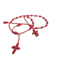 It has a adjustable pull cord to fit all size wrist. Pull bracelet to open to put on and then pull on the cords to tighten it Handmade Red Braided Nylon Cord Bracelets, Handmade Red Nylon Cord Braided Bracelets, Adjustable Red Nylon Cord Bracelet, Adjustable Red Braided Nylon Cord Bracelet, Adjustable Red Nylon Cord Braided Bracelet, Handmade Red Braided Bracelets With Nylon Cord, Adjustable Red Beaded Bracelet For Gift, Handmade Red Adjustable Friendship Bracelets, Adjustable Red Braided Nylon Bracelet