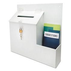 a white mailbox with a key hanging from it's side and a card holder in the front