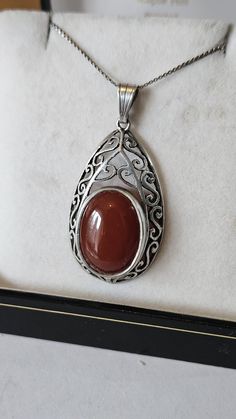 Please inspect photos for condition. Any questions please ask. All items are vintage or Antique and may have slight defects. Postage within 2 days of payment. Thank you for checking out my listing 😊 Vintage Gemstone Necklace With Oval Cabochon, Vintage Carnelian Necklace As Gift, Vintage Carnelian Necklace Gift, Vintage Carnelian Necklace For Gifts, Vintage Carnelian Necklace For Gift, Vintage Brown Carnelian Necklace, Vintage Carnelian Engraved Jewelry, Vintage Hallmarked Oval Cabochon Necklace, Vintage Silver Carnelian Necklace