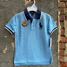 Nwt Polo Ralph Lauren Boys' Big Pony Cotton Mesh Polo Shirt In Blue. Authentic. - Ribbed Polo Collar - Two-Button Placket - Short Sleeves With Ribbed Armbands - Twill "3" Patch At The Right Sleeve - Signature Embroidered Big Pony At The Left Chest - Tennis Tail -Armpit To Armpit: 15", Length: 20" Front, 22" Back. -100% Cotton Preppy Short Sleeve Blue Shirt, Ralph Lauren Polo Shirt, Blue Collared Preppy Tops, Preppy Blue Short Sleeve Shirt, Preppy Blue Collared Top, Preppy Blue Polo Collar Top, Preppy Blue Cotton Polo Shirt, Blue Fitted Preppy Tops, Blue Polo Shirt For Streetwear